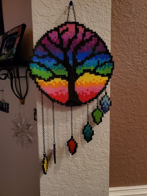 #perler #beads #tree #rainbow Perler Bead Tree Pattern, Tree Of Life Perler Bead Patterns, Perler Bead Wind Chimes, Cute Perler Designs, Tree Perler Bead Patterns, Pride Hama Beads, Rainbow Perler Beads, Melting Beads Patterns Easy, Nature Perler Beads