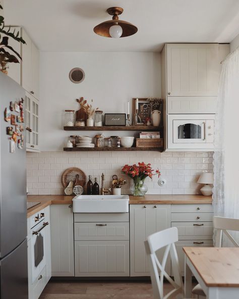 29 Small Kitchen Ideas to Maximize Your Space Elegantly - placeideal.com Light Academia Kitchen, Beige Kitchen Cabinets, Wooden Countertops, Glass Soap Dispenser, Beige Kitchen, Sustainable Kitchen, Compact Kitchen, White Cabinetry, Wood Countertops