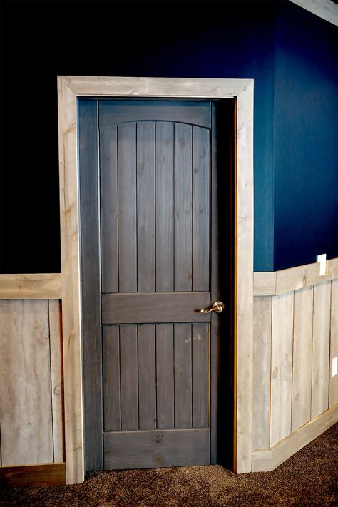 Rustic Interior Trim Ideas, Black Door Wood Trim, Painted Interior Doors With Stained Trim, Painted Door Wood Trim, Log Cabin Doors, Black Doors With Wood Trim, Pine Baseboards And Trim, Black Interior Doors With Wood Trim, Rustic Door Trim