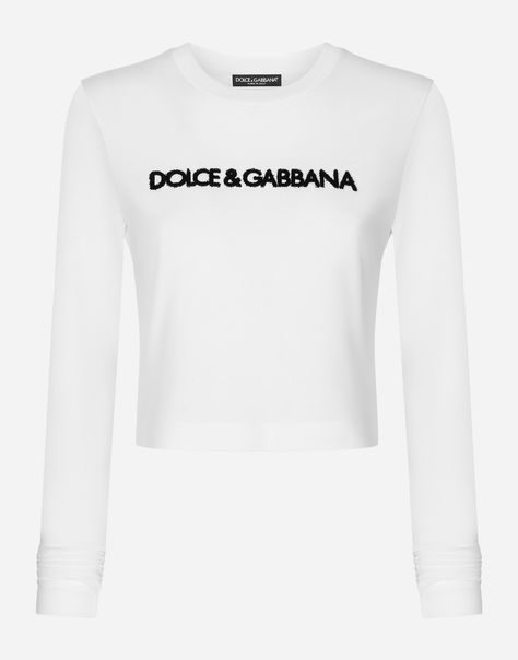 Long-sleeved stretch jersey T-shirt with Dolce & Gabbana logo: White Round neck Long sleeves Form fitting The piece measures 48 cm from the center back on a size IT 40 The model is 175 cm tall and wears a size IT 40 Made in Italy Dolce And Gabbana T Shirt, Dolce & Gabbana Logo, Dolce Gabbana T Shirt, White Long Sleeve Top, Latest T Shirt, Jersey Shirt, Dolce & Gabbana, White Sweatshirt, Jersey T Shirt