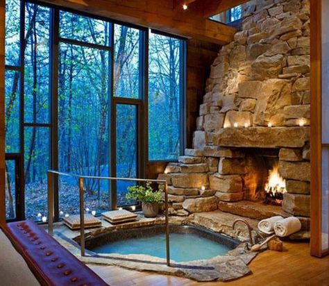 Rock-lined hot tub in front of fireplace and forest-view windows Indoor Pools, Interior Minimalista, Log Home, Indoor Fireplace, House Goals, Cabins In The Woods, Tiny Homes, Log Homes, Indoor Pool