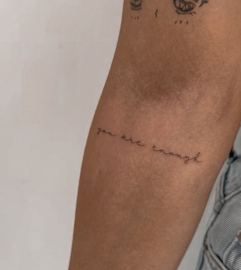 Your Enough Tattoo, Time Heals Tattoo, Arm Writing Tattoo, Word Tattoos On Arm, Inner Elbow Tattoos, Arm Quote Tattoos, Enough Tattoo, Inner Arm Tattoos, Cuff Tattoo