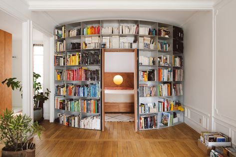 Futuristic Interior Design, Oak Parquet Flooring, Bow Window, Futuristic Interior, Iconic Furniture, Built In Bookcase, Paris Apartments, Wood Interiors, Multifunctional Furniture