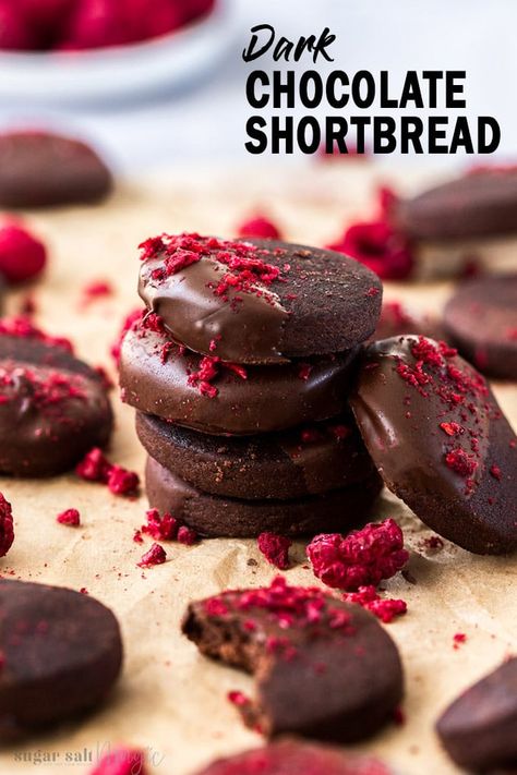 These easy, 5 ingredient Dark Chocolate Shortbread Cookies are rich, dramatic and totally luxurious. Using dark cocoa, these short, bittersweet chocolate cookies are dipped in chocolate and sprinkled with crushed freeze-dried raspberries. This is a perfect recipe for edible food gifts at Christmas too. #sugarsaltmagic #shortbread #chocolatecookies #chocolateshortbread #shortbreadrecipe Dark Chocolate Shortbread, Sandwich Cookies Filling, Chocolate Shortbread, Short Bread, Chocolate Shortbread Cookies, Dipped In Chocolate, Freeze Dried Raspberries, Dried Raspberries, Shortbread Recipes