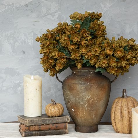 These artificial hops bushes, featuring a beautiful green hue, are perfect for adding color and texture with a farmhouse feel to your home this Fall. Minimum of 3 Measures 16"L Fall Urn, Wreath Living Room, Closet Freshener, Natural Fall Decor, Herb Bouquet, Pretty Porches, Herb Wedding, Herb Wreath, Apartment Designs