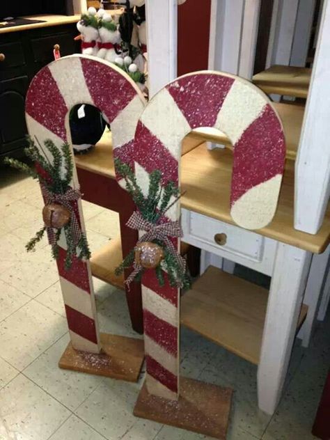 Wood candy canes, Cute idea to line my sidewalk! Wooden Candy Canes Yard Art, Wood Candy Canes Christmas Decorations, Wood Candy Cane Diy, Diy Outdoor Wood Christmas Decorations, Wood Candy Canes, Wood Christmas Ideas, Wooden Candy Canes, Christmas Wood Cutouts, Outdoor Wooden Christmas Decorations