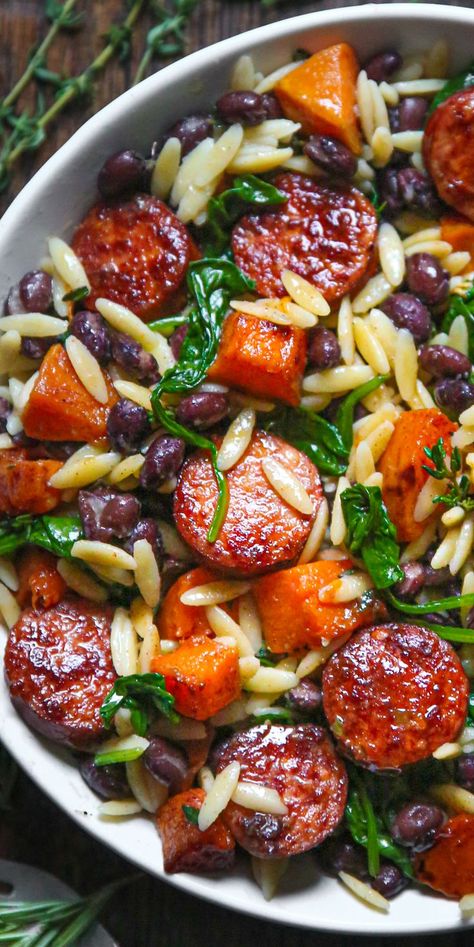 Butternut Squash and Black Bean Orzo with Sausage and Spinach in a white bowl. Orzo With Sausage, Lemon Greek Yogurt, Sausage And Spinach, Greek Yogurt Sauce, Autumn Dinner, Yogurt Sauce, Squash Recipes, Sausage Recipes, Cheap Meals