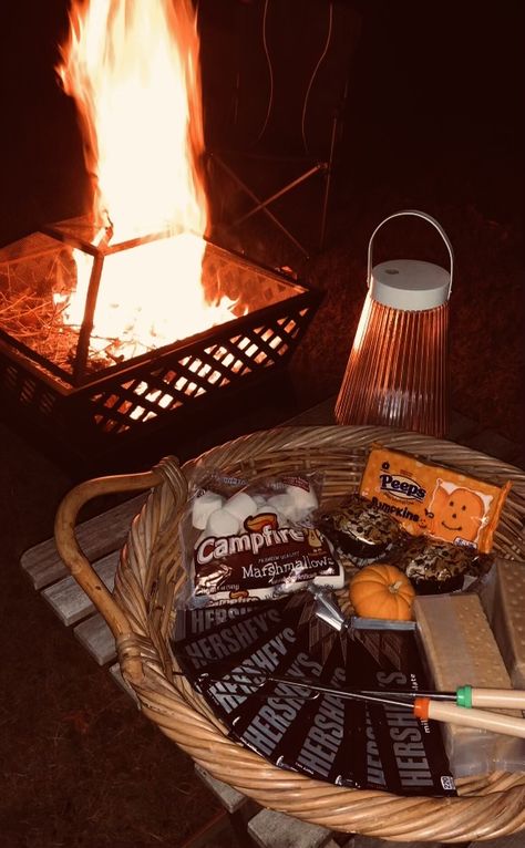 Roasting marshmallows by the fire! #smores #peeps #pumpkin #hersheys #chocolate #grahamcracker #campfire #firepit #bonfire #cupcakes #dessert #sweettreat #autumn #fall #spooky season #spookymonth #october #outdoor #nature #camping #backyard #cozy Autumn Bonfire Aesthetic, Roasting Marshmallows Outdoors, Bonfire And Smores, Backyard Aesthetic Night, Autumn Birthday Aesthetic, Fall Bonfire Aesthetic, Smores Aesthetics, Halloween Bonfire Party, Spooky Camping