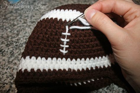 Free Crochet Football Hat Pattern | ... find the closest stitch to the center of the hat and sew the laces on Crochet Football Helmet, Crochet Football Pattern, Crochet Football Hat, Crochet Football, Crocheted Hat, Crochet Hat Free, Crochet Knit Hat, Crochet Bebe, Crochet Baby Hats