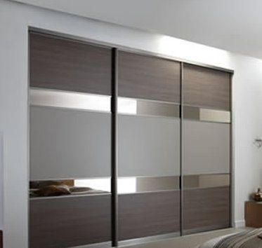 sliding robes hull Grey brown Ontario walnut, bronze mirror, dakar with the lacquered bronze frame Cubords Ideas Bedroom With Mirror, Panel Closet Doors, Sliding Wardrobe Designs, Wardrobe Laminate Design, Sliding Door Wardrobe Designs, Wall Wardrobe Design, Modern Cupboard Design, Wardrobe Door Designs, Bedroom Interior Design Luxury