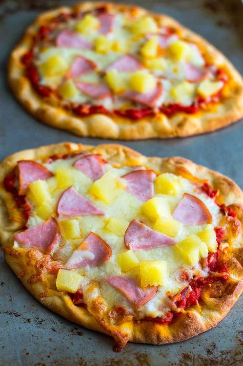 Hawaiian Naan Pizza makes a deliciously easy dinner that's cheaper, faster, and healthier than delivery! From BakingMischief.com | Homemade Pizza | Dinner for Two | #Pizza | Hawaiian Pizza Recipe, Pizza Naan, Ham Pineapple, Naan Bread Pizza, Naan Pizza Recipes, Pain Naan, Flatbread Pizza Recipes, Naan Flatbread, Homemade Pizzas