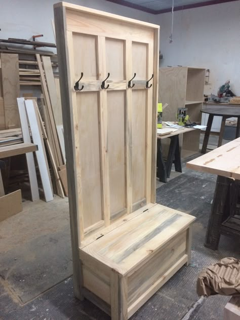 This hall tree is made with blue stain pine. It has hooks on the top. The bottom is a box with a lid that opens for storage. A water based polyurethane is added to protect and enhance the wood. I build all of the pieces myself from start to finish. I have been making furniture for 14 years. Rustic Hall Tree Entryway, Rustic Hall Tree, How To Build A Hall Tree, Hallway Tree Entryway, Farmhouse Hall Tree, Hall Tree Ideas, Hall Trees, Diy Hall Tree With Storage, Hall Tree Plans