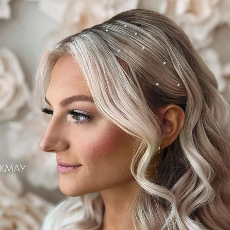 I Do Hair by Kimberly May LLC  Wedding/Event Hair - IL | WI on Instagram: "Tucked Back with Pearls, a fan fav.   What to ask for👇🏻  + Bangs left out with Light Framing + Sides Swept Back + Fluffy Waves + Pearls Pearls Pearls 🥰  Comment 🧜🏻‍♀️ for the Pearls!  🖤 Link in Bio * 2024/2025 Booking Inquiries * Rates * Discounts * Reviews  🖤 Save & Share with a friend needing inspo!  #idohairbykmay  #chicagoweddinghair  #chicagoweddinghairstylist  #lakegenevahairstylist  #weddinghairstylistchicago  #bridesmaidhair  #glamwaves  #longlastinghairstyle  #weddingtips  #weddinghairtips  #fluffywaves  #luxyhairpartner  #luxyhair  #halfuphalfdown #partypony #highupdo  #napervilleweddinghair #elginweddinghair #schaumburgweddinghair  #chicagosuburbsweddinghair" Slicked Hair With Pearls, Bridal Hair Down With Pearls, Hair Down With Pearls, Pearl Hairstyles Wedding, Wedding Hair With Pearls, Hairstyles With Pearls, Pearl Hairstyles, Wedding Hair Tips, Semi Formal Hairstyles