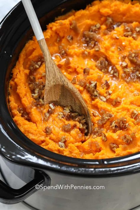 Serve this crockpot sweet potato casserole at your next dinner! It's a classic side at Thanksgiving or perfect for any occasion. Just cook and mash the sweet potatoes and top with a pecan brown sugar topping. #spendwithpennies #sweetpotatocasserole #crockpot #slowcooker #sweetpotatorecipe #sidedish Sweetpotatocasserole Crockpot, Crockpot Sweet Potato Casserole, Sweet Potato Casserole Crock Pot, Crock Pot Sweet Potatoes, Dinner Feast, Crockpot Potato, Sweet Potato Dishes, Slow Cooker Sweet Potatoes, Thanksgiving Foods