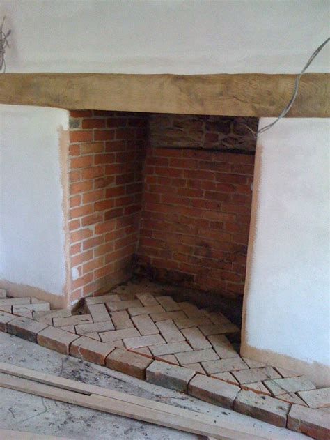 Fireplace Brick Hearth, Brick Woodstove Surround, Brick Fireplace Hearth Ideas, Fire Hearth Ideas, Herringbone Hearth, Herringbone Brick Fireplace, Brick Fireplace Kitchen, Brick Hearth Fireplace, Brick Fireplace Hearth