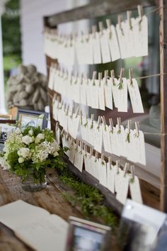 table assignment idea: hung in rows on an old picture-frame with a bit of greenery and rustic white blooms around it Wedding Table Assignments, Rustic Card Box Wedding, Table Assignments, Seating Plan Wedding, Card Box Wedding, Seating Chart Wedding, Wedding Places, Wedding Seating, Seating Chart