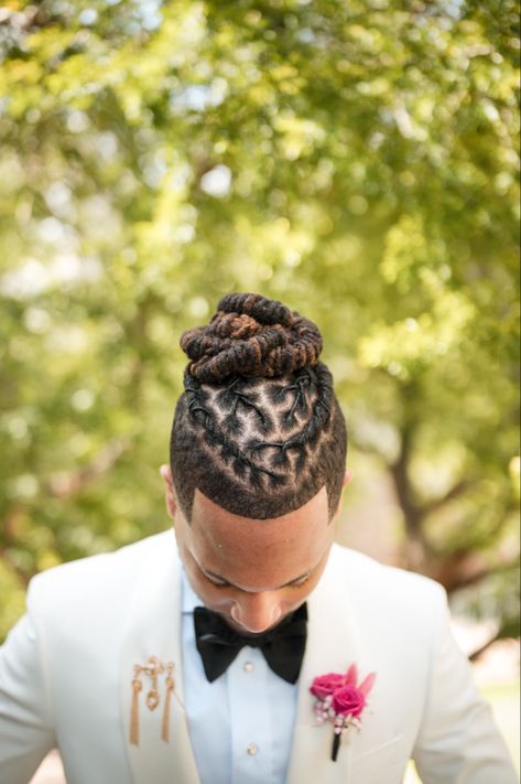 Fresh retwist with rope twist bun for a sophisticated groom Groom Locs Hairstyles, Formal Dreadlock Hairstyles For Men, Formal Loc Styles For Men, Wedding Locs Hairstyles Men, Crown Dreadlock Styles, Men Wedding Loc Styles, Men Dread Styles Updo, Prom Loc Hairstyles Men, Professional Dreadlock Hairstyles Men