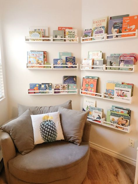 Book Shelves For Toddlers, Book Shelves Ikea, Reading Nook In Nursery, Ikea Hack Bookshelves Kids, Ikea Spice Rack Hack Kids Rooms, Book Shelves Kids Room, Ikea Reading Corner, Toddler Reading Nook Boy, Book Shelves For Kids Room