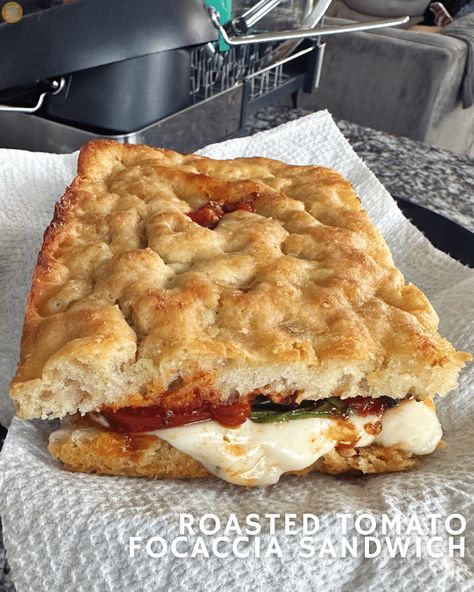 Roasted Tomato Focaccia Sandwich: seasoned roasted tomatoes, basil, and mozzarella on extra-garlicky focaccia bread. Heavenly! Focaccia Bread Sandwich, Focaccia Sandwiches, Tomato Focaccia, Focaccia Sandwich, Foccacia Bread, Mozzarella Sandwich, Roasted Garlic Cloves, Tomato Mozzarella, Tomato Sandwich