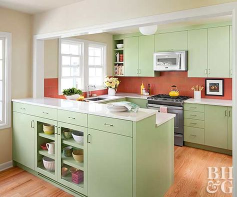 Green and red aren't just for Christmas! Sweet mint-green cabinetry pairs up with a bright red brick backsplash for a bold style statement. The contrasting colors add a bit of surprise without overpowering the calm feel of the kitchen. 1940s Kitchen Remodel, Small Kitchen Remodel Cost, 1970s Kitchen Remodel, Inexpensive Kitchen Remodel, 1940s Kitchen, Kitchen Remodel Plans, Small Kitchen Cabinets, Galley Kitchen Remodel, Kitchen Remodel Cost