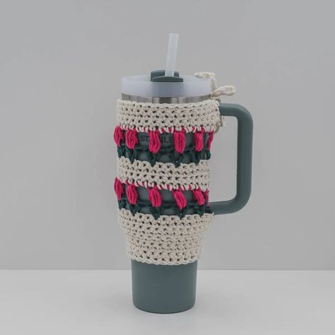 "The Stanley Tumbler is already fantastic, but it becomes truly unique when you add a personalized crochet cozy, holder, or boot.The Tulip Crochet Stanley Cozy pattern is a fantastic way to personalize your Stanley Quencher, making it uniquely yours.  All you need is some spare cotton yarn and a bit of spare time to create this charming accessory with ease.  Just grab your crochet hook and yarn, and get ready to give your Stanley cup a touch of personal flair that will surely make it stand Stanley Cup Crochet Holder, Crochet Stanley Cup Holder, Crochet Hook And Yarn, Religious Christmas Crafts, Cup Cozy Crochet Pattern, Christmas Stockings Sewing, Christmas Crafts Snowman, Knit Christmas Ornaments, Kids Christmas Coloring Pages