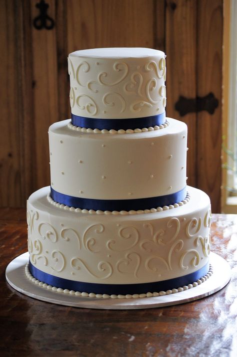 Wedding Cake Borders, Fake Wedding Cake Ideas, Blue White Gold Wedding Cake, Blue And Silver Wedding Cake, Simple Wedding Cake Navy Blue, Navy Blue Wedding Cake, Royal Blue White And Silver Wedding Cake, Wedding Cake With Ribbon, Royal Blue Wedding Cake 2 Tier