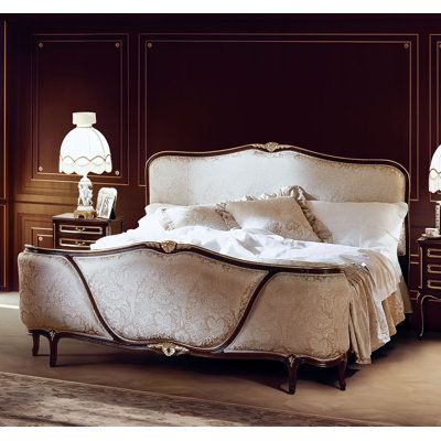 French Baroque King Size Bed. Upholstered headboard and footboard. Shown in walnut finish with 24 Karat antique gold accents. | David Michael King Standard Bed Wood & Upholstered / Silk / in Brown / White | 46 H x 84 W x 84 D in | Wayfair Unique King Bed, Bed Upholstered Headboard, French Canopy Bed, Houses Styles, Pretty Architecture, Winged Bed, French Baroque, Empire Furniture, Cottagecore Home