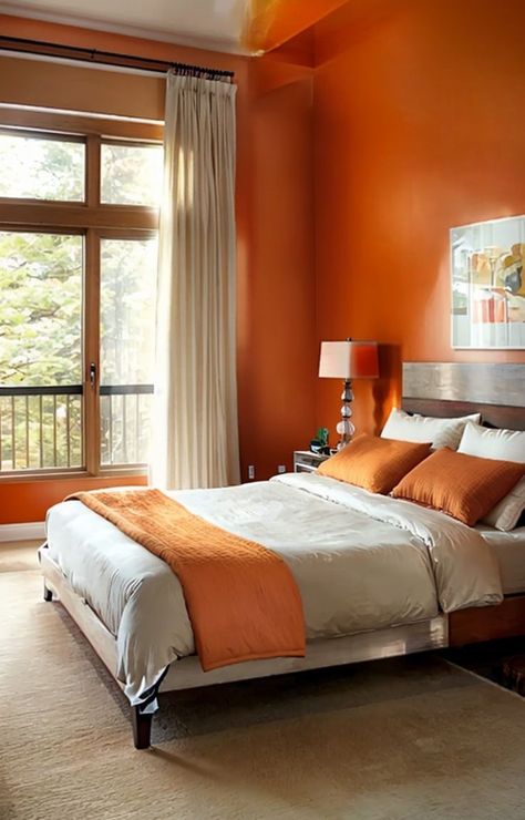 Achieve a vibrant bedroom aesthetic by painting one wall a bold shade of orange. Complement the color with neutral furniture and decor, such as a white bed frame and wooden accents, for a balanced and stylish look. Orange And White Bedroom, Vibrant Bedroom, White Bedroom Design, Orange Bedroom, White Bed Frame, Neutral Furniture, Bedroom Orange, White Bed, Orange You Glad