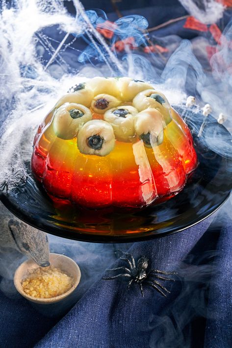 Three layered jelly is shown with lychees stuffed with blueberries that look like eyeballs. Halloween Jelly, Best Cast Iron Skillet, Green Jelly, Perfect Halloween Party, Fun Halloween Food, Soup Maker, Halloween Baking, Halloween Eyeballs, Best Slow Cooker