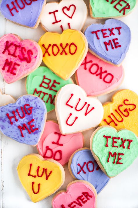 These Conversation Heart Sugar Cookies are a fun treat to make and even better to eat. With a super soft sour cream sugar cookie base and a smooth buttercream frosting you're sure to fall in love. Sour Cream Sugar Cookies, Heart Sugar Cookie, Slow Cooker Creamy Chicken, Valentine Sugar Cookies, Conversation Heart, Heart Cookies, Valentine Cookies, Converse With Heart, Valentine Birthday