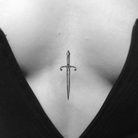 Women Sternum Tattoo Ideas, Minimalist Tattoo Swords, Swords Sternum Tattoo, Sternum Tattoo Dagger, Dagger Tattoo Sternum, Tattoos Between The Breast, Dagger Tattoo Women, Dagger Sternum Tattoo, Yes Sir Tattoo