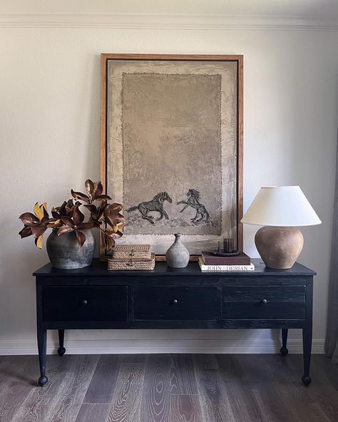 You guys - how stunning is my new piece of art by my talented friend @christiannetaylor ?! I'm trying to decide if it should go here or in my living room but I feel like it's absolutely perfect on this console table. I've linked everything else in my LTK. https://ltk.app.link/aBlyN1GZPMb #consoletabledecor #homedecor #ltkhome #interiordesign #oilpainting #afloral #oliveateliers Large Entryway Artwork, Large Mirror Console Table, Tv Console Traditional, Console Table Picture Wall, Moody Console Table Decor, Console Table With Art Above, Dresser As Console Table, Tv Console Wall Decor, Console Table Styling Dining Room