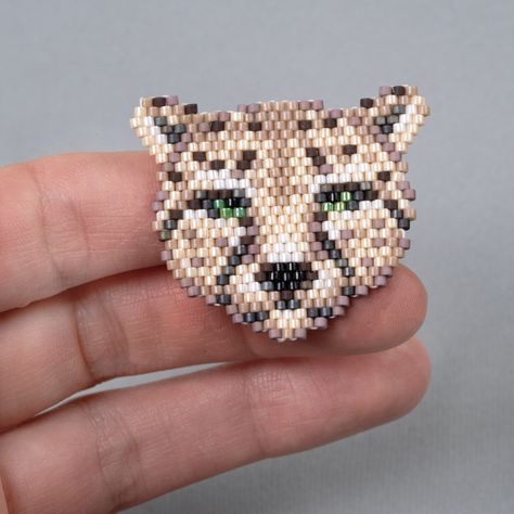 Discover the beauty of beadwork with this exquisite beaded cheetah pattern! 🐆✨ This detailed design is perfect for anyone looking to create a stunning piece of art with high-quality Japanese miyuki beads. The PDF pattern is now available for purchase through the link in our profile. Start your bead weaving journey and bring this majestic cheetah to life! 📎 Click the link in the profile to get the PDF pattern. #BeadedCheetah #JapaneseBeads #beadwork #brickstitch #beading #miyukipattern #beadp... Miyuki Beads Pattern, Cheetah Pattern, Piece Of Art, Detailed Design, Miyuki Beads, Brick Stitch, Bead Weaving, Beading Patterns, Click The Link