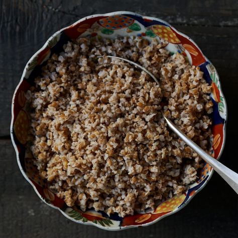 This Ethiopian buttery grain porridge recipe is often served for breakfast, but you can also top it with other dishes like messer wot (spiced lentils) or gomen (Ethiopian-spiced collards) for lunch or dinner and eat it in place of the traditional flatbread, injera. #breakfast #recipe #eatingwell #healthy Oatmeal Porridge Recipes, Savory Oatmeal Recipes, Spiced Lentils, Savory Oatmeal, Cracked Wheat, Savory Rice, Wheat Recipes, Porridge Recipes, Ethiopian Food