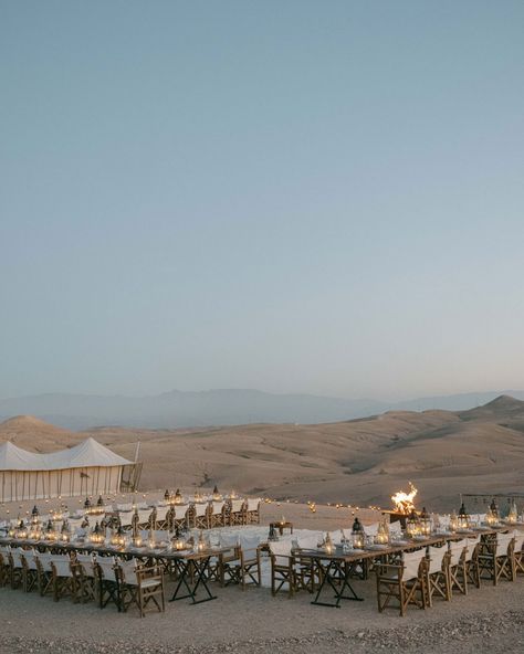 An unforgettable welcome party we created in the middle of a desert with an all white dress code, celebrating the arrival of guests to Morocco for a multi day wedding following a more intimate roof top gathering in the medina. With poolside drinks as the sun set, and a spectacular dining experience under the stars surrounding my thousands of candles, before a live fire show and music to dance around the fire pits. 📷 @katiejulia_ #destinationwedding #partyplanner #weddingplanner #weddingin... Wedding Egypt, Marrakech Wedding, Venice Lido, Global Wedding, Celebration Around The World, Luxury Weddings, Best Wedding Planner, Luxury Wedding Planner, Luxury Event