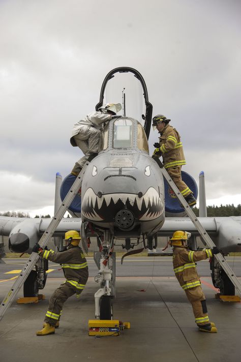 U.S. Air Force and Estonian firefighters simulate egress procedures during a… Air Force Firefighter, Jet Air, Estonia Travel, North Europe, Air Planes, Military Jets, U S Air Force, United States Air Force, Latvia