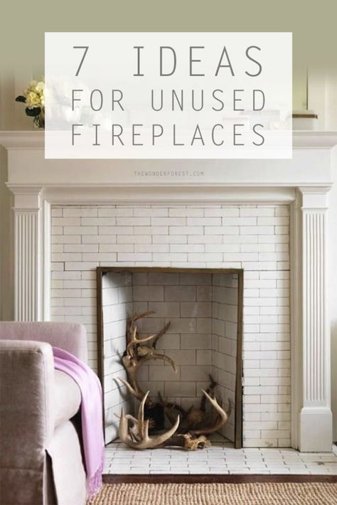 7 Awesome Ideas for an Unused Fireplace | Wonder Forest Unused Fireplace, White Brick Fireplace, Bedroom Transformation, Deer Heads, Bedroom Arrangement, White Fireplace, Faux Fireplace, Up House, White Brick