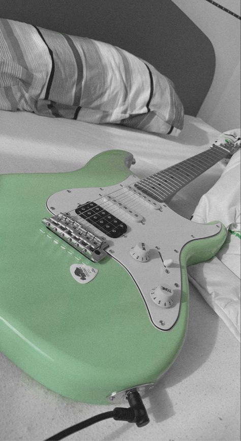 sage green guitar and pick only sage green color Green Guitar Wallpaper, Sage Green Guitar, Green Guitar, Green Music, Sage Green Wallpaper, Anime Lock Screen Wallpapers, Anime Lock Screen, Fav Color, Random Aesthetic