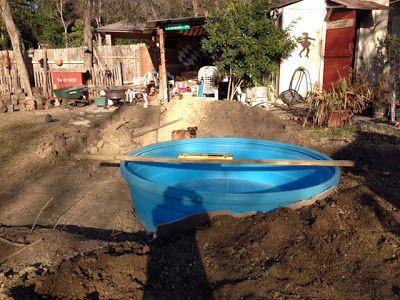 We decided to bury our 8' poly stock tank in the backyard to make it an in-ground pool or little spa really.  We bought the stock tank s... In Ground Stock Tank Pool Ideas, Built In Stock Tank Pool, Buried Stock Tank Pool, Plastic Stock Tank Pool Ideas, Poly Stock Tank Pool Ideas, Plastic Stock Tanks, Poly Stock Tank, Playground Backyard Diy, Swimming Pool Cost