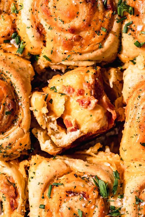 These bacon cheese rolls are packed with swirls of cheese, bits of bacon, and loads of flavour. They're soft, fluffy, and easy to make. Cheese And Bacon Rolls, Bacon Rolls, Blueberry Cinnamon Rolls, Lemon Pancakes, Bacon Roll, Lemon Ricotta Pancakes, Cheese Rolls, Muffins Vegan, Bacon And Cheese