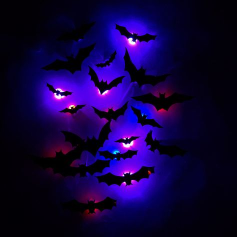 Description: Transform your space into a haunted haven with our Halloween Lighted 3D Bat Decor. These eerie, lifelike bat decorations come equipped with LED lights, bringing an extra level of spooky ambiance to your Halloween setup. Main Features: Crafted from premium PVC material Notched lines allow for easy folding and adjusting of wing angles Powered by button cell batteries (included) Perfect for decorating walls, windows, ceilings, doors, and more Ideal for Halloween, parties, ghost festivals, and more Specifications: Product Size Please refer to product picture for size details Package Components 24 x Halloween Lighted 3D Bat Decoration Halloween Setup, Bat Decor, Bat Light, Home Stickers, Bat Decorations, Bat Wall, Decorating Walls, Halloween Bat, Wall Ornaments