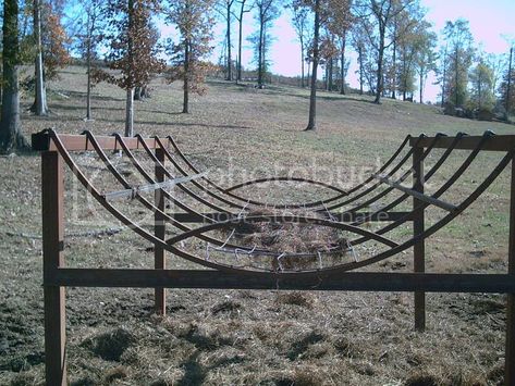 Round bale hay cradle questions | CattleToday Diy Round Bale Feeder Horses, Round Bale Feeder Diy, Cattle Feeder Ideas, Indoor Arena Horse, Bore Goats, Round Bale Hay Feeder, Cow Feeder, Show Cattle Barn, Sheep Feeders