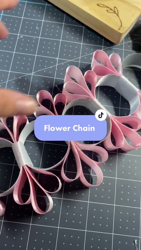 The flower power chain is cute, but definitely a little time consuming... | Chain | TikTok Mini Homecoming Mums Diy, Homecoming Ribbons Diy, Small Homecoming Garter, All White Mums Homecoming, Homecoming Mum Neck Strap, Homecoming Mum Chains, Western Mums Homecoming, Diy Homecoming Mums, Hoco Mums Ideas