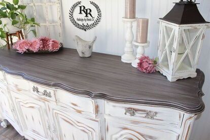 This Sideboard/buffet was dated so I gave it a little redesign with a shabby chic farmhouse style look! French Provincial Sideboard redesigned to a shabby chic farmhouse style! I painted the base of the cabinet with Country Chic Paint in Simplicity, distressed with a 100 grit sanding block, and sealed with natural wax. Did you know that you could stain over paint? You can! Don't want to sand down to bare wood to be able to stain? Paint it then stain it! All you need is an absorba… French Provincial Sideboard, Stain Over Paint, Country Chic Paint, Sanding Block, Shabby Chic Farmhouse, Chic Farmhouse, Ace Hardware, Natural Wax, French Provincial