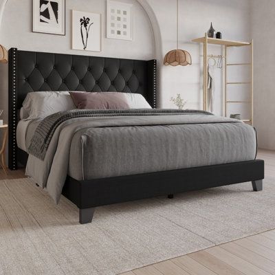 Enhance your bedroom with this tufted upholstered panel bed to bring your bedroom an elegant and contemporary style Size: Twin, Color: Black | Winston Porter Lauden Bed Upholstered / Polyester in Black | 48.4 H x 44.5 W x 82.1 D in | Wayfair Black Upholstered Bed, Upholstered Beds Grey, Black Bed Set, Black Bed Frame, Adjustable Bed Base, Modern Platform Bed, Wingback Bed, Bed Queen, Upholstered Panel Bed