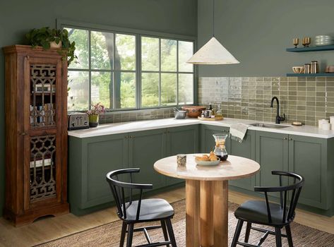 Read on to learn about nine shades the pros hope to incorporate into their work over the coming months. Rosemary Paint Sherwin Williams, Rosemary Paint, Designer Paint Colors, Green Kitchen Walls, Best Wall Colors, Rosemary Green, Orange Rooms, Blue Ceilings, Comfortable Kitchen