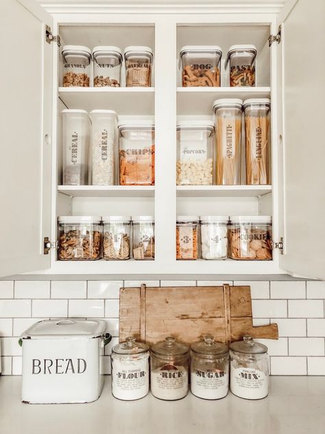 Food Cupboard Organization, Small Pantry Organisation Tiny Kitchens, Pantry Storage Glass Containers, Pantry Organization Glass Containers, Pantry Organization Clear Containers, Organized Pantry Asthetic, Labeled Pantry Containers, Tiny Pantry, Small Kitchen Pantry