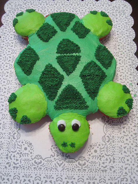 cupkcake turtle cake | turtle cupcake cake this turtle cupcake cake is a great way to ... Turtle Cupcake Cake, Turtle Cupcake Cakes Pull Apart, Frog Pull Apart Cupcake Cake, Turtle Shaped Cake, Easy Turtle Cake Birthdays, Turtle Birthday Cake, Turtle Cupcakes, Cake Pulls, Pull Apart Cupcake Cake