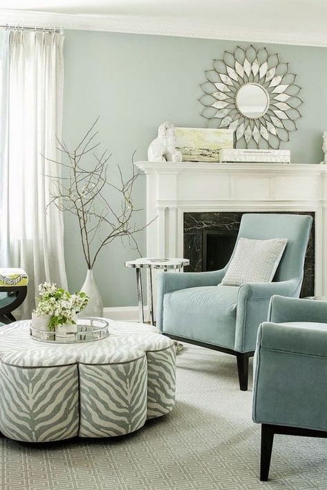 colors that go with grey light turquoise armchairs ottoman with zebra print in front of fireplace very light green walls Color Palette For Home, Living Room Color Schemes, House Color Schemes, Room Color Schemes, Room Paint Colors, Elegant Living Room, Paint Colors For Living Room, Elegant Living, Living Room Colors