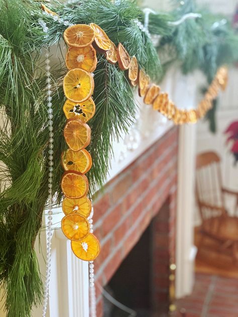 3 bags of clementines, a mandoline, hooks & finishing wire are necessary tools for your holiday decorating this season #holiday #garland #diy #diyhomedecor Citrus Garland, Dehydrated Citrus, Spoon Fork Bacon, Fruit Ornaments, Garland Diy, Orange Slice, Dried Orange Slices, Dried Oranges, Natural Christmas